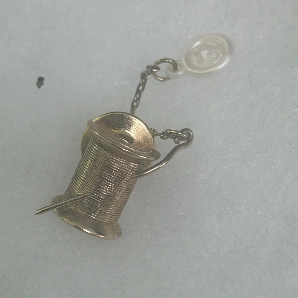 Avon Gold Tone Spool of Thread Needle and Button Sewing Lapel Pin Vintage #756